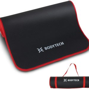 BODYTECH Exercise yoga mat with edge protection and extra wi...
